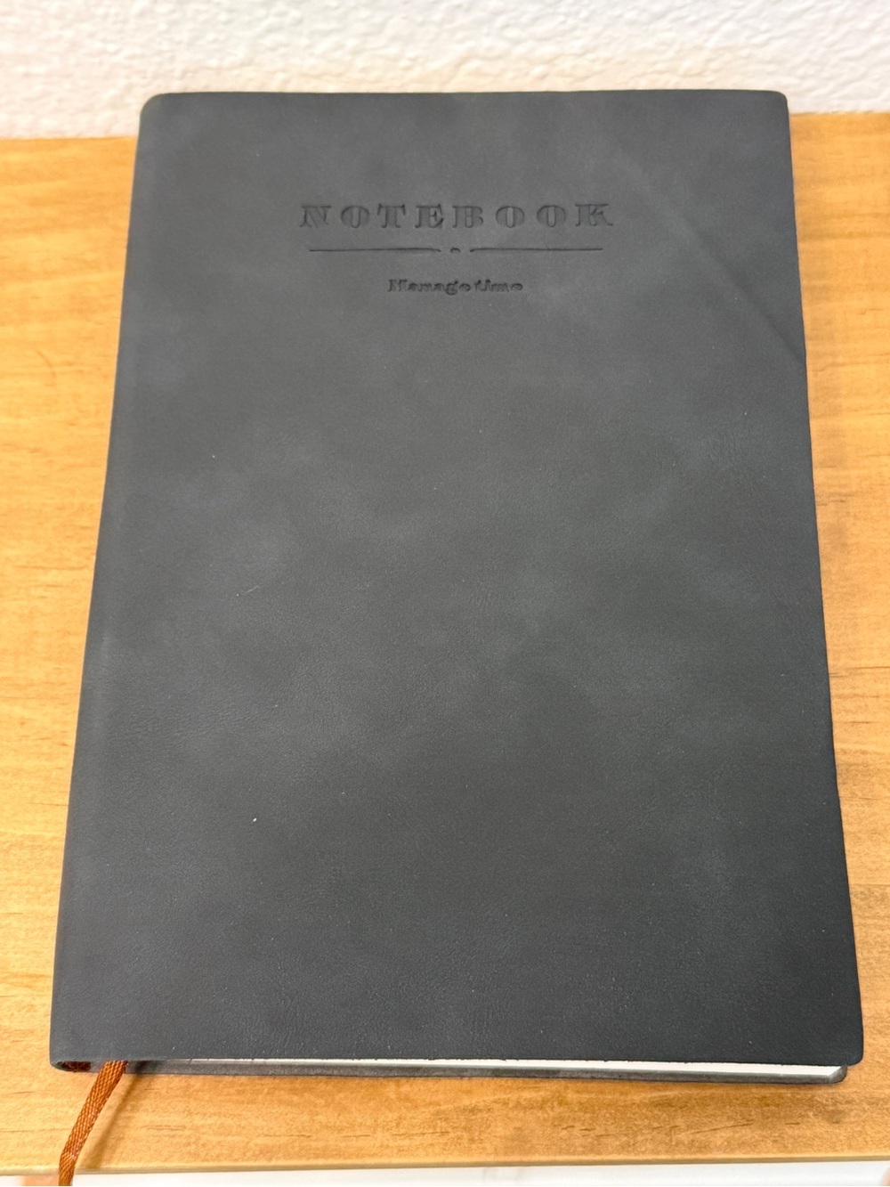 Classic Black Notebook with Embossed 'NOTEBOOK' Cover